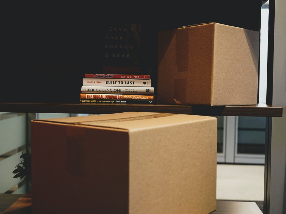 Cardboard boxes on office desk 